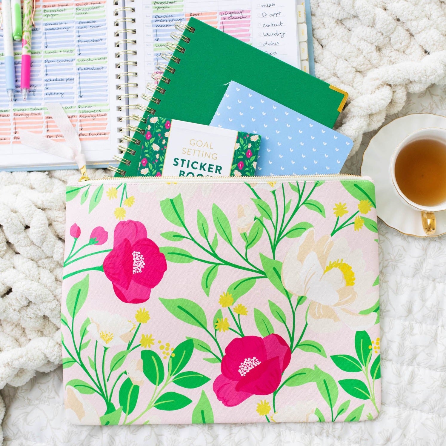 http://cultivatewhatmatters.com/cdn/shop/files/CarryAllPouch_Blooms4342_1.jpg?v=1693923600